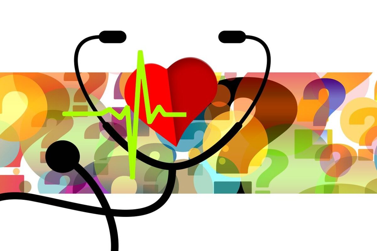 Picture of a stethoscope in front of a color block of question marks in varying sizes.